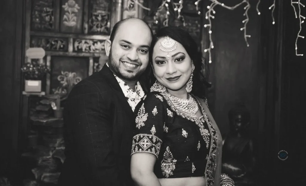 Indian couple smiling at the camera for Ruchika Jain Photography.