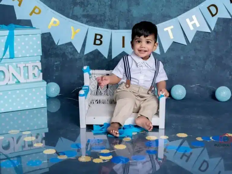 Fun-filled cake smash photography session capturing joy and excitement