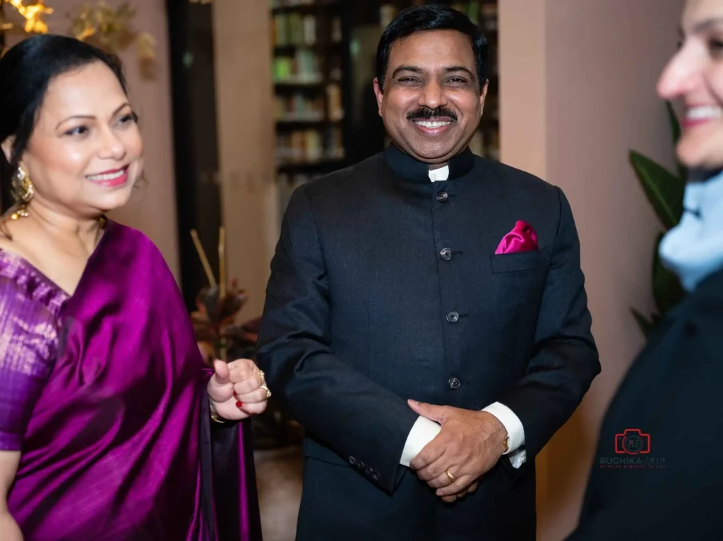 Joyful Moments at an Organized Event: A smiling man and a lady wearing a saree captured during an event photography session in Wellington
