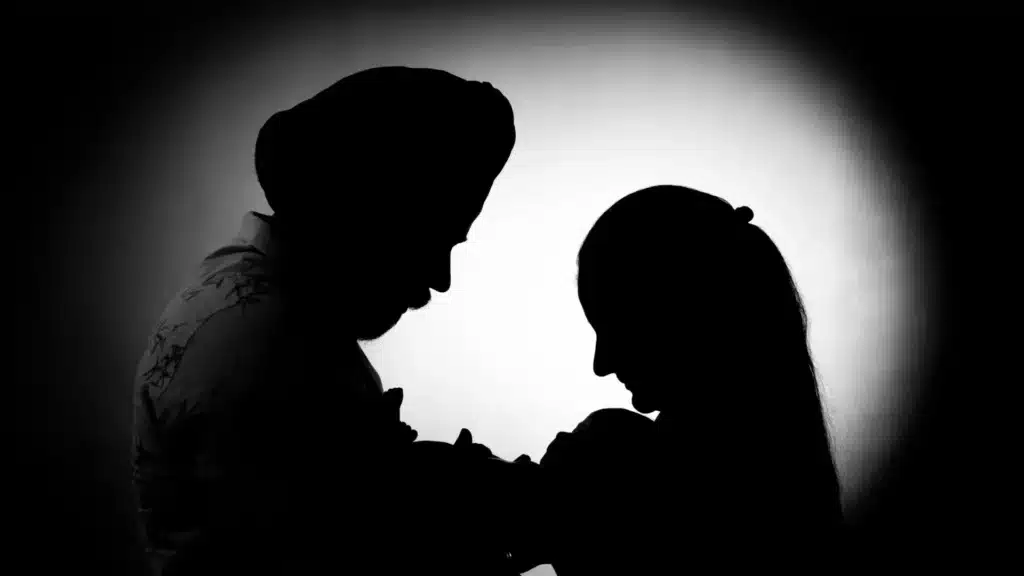 Elegant coupleโs portrait in Wellington's historic district by a professional photographer