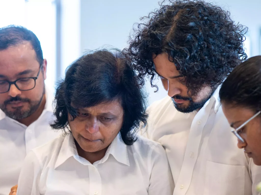 Emotional Farewell: A heartfelt moment of grief as mourners bid their last farewell to the departed soul at a funeral in Wellington, New Zealand