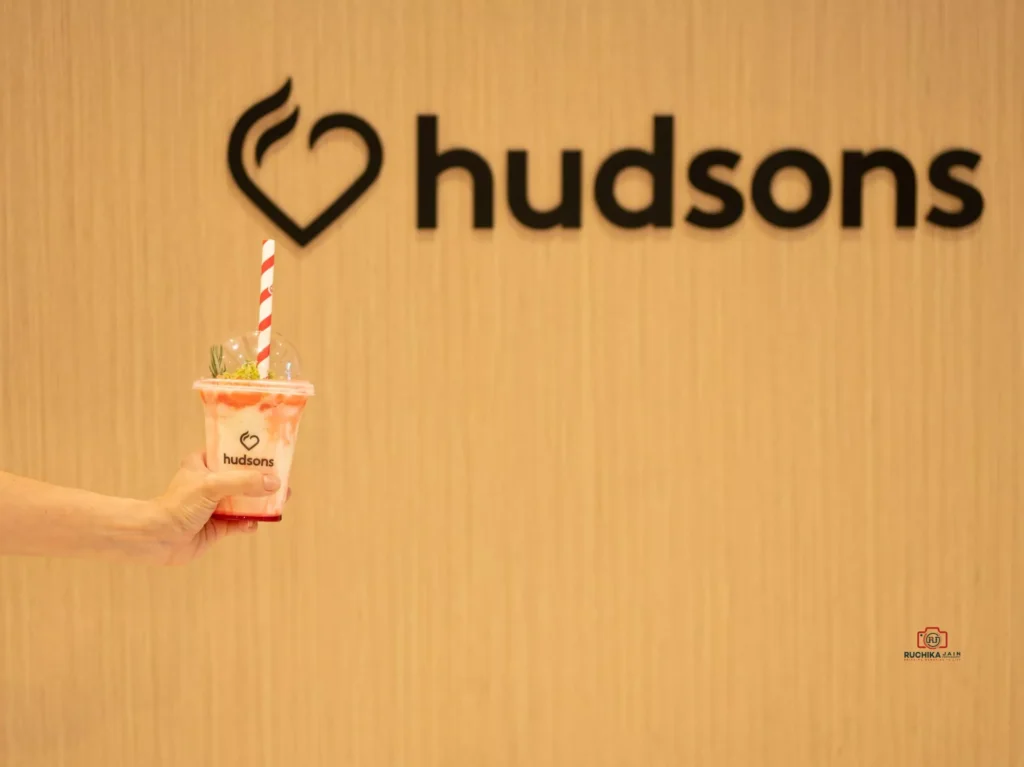 Refreshing smoothie served with Hudsons branding and logo - commercial photography