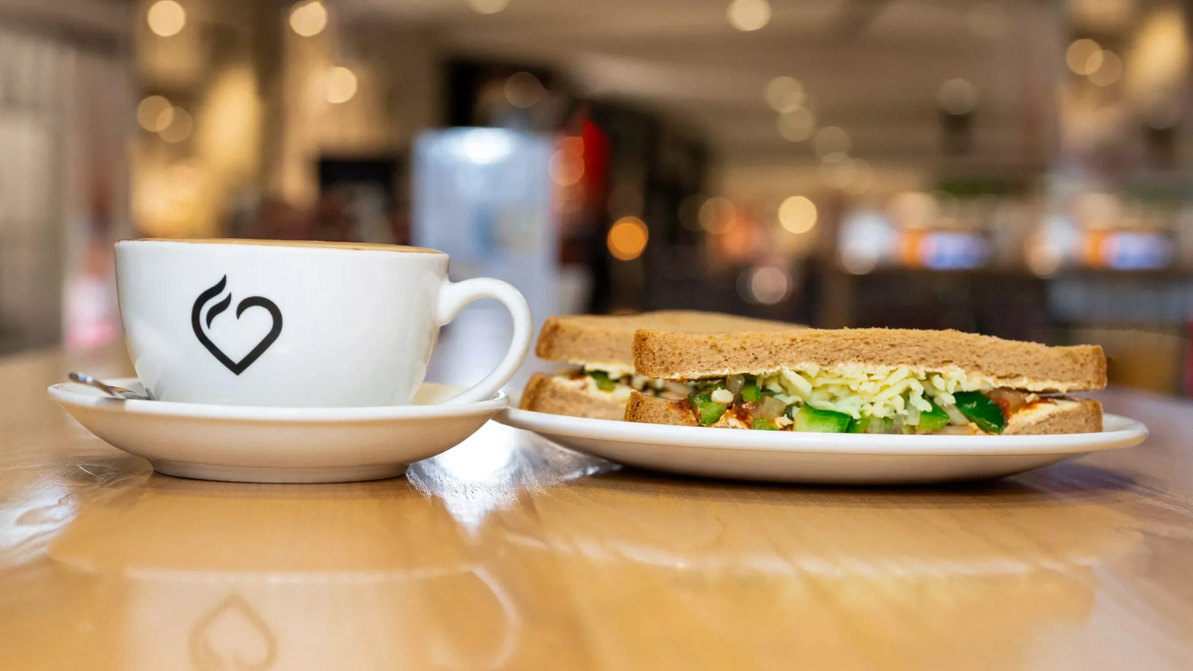 Commercial Photography: A delightful coffee and sandwich spread showcased by Hudsons Restaurant, Wellington