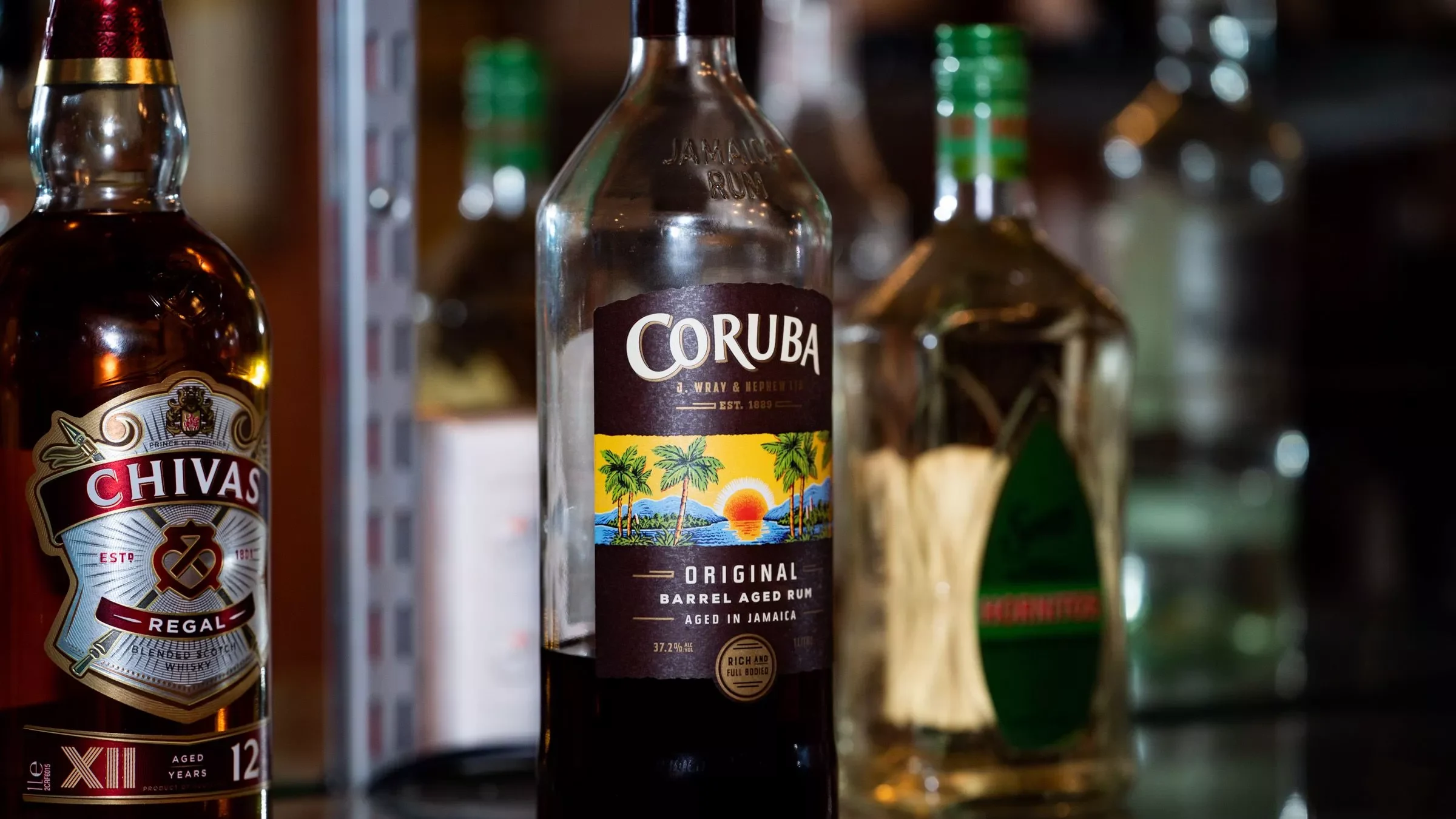 Commercial Photography: A restaurant bar showcasing a variety of beer and wine bottles in a well-arranged display