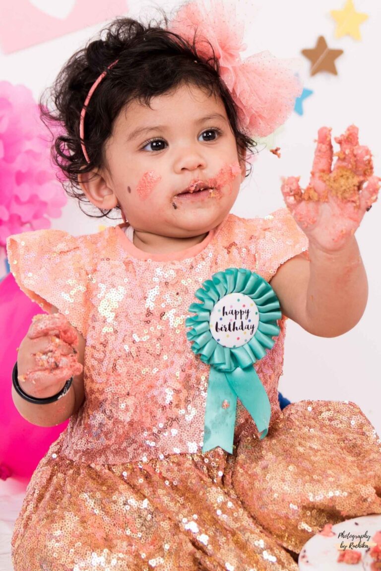Cake smash photography session showcasing the child's playful spirit.