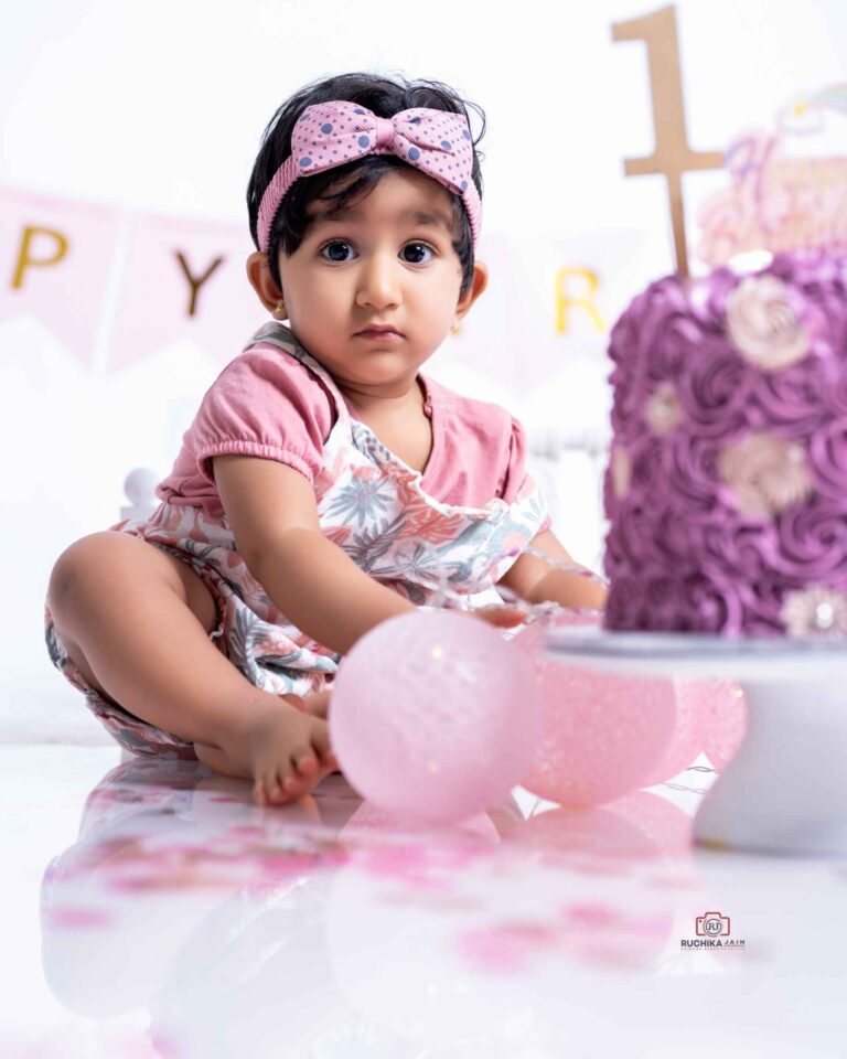 Vibrant and fun cake smash session with a professional photographer