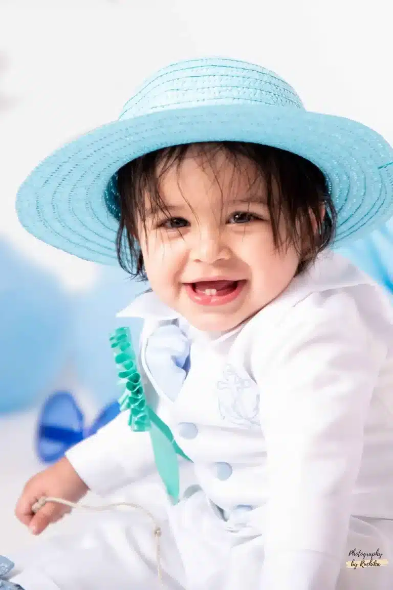 Fun-filled cake smash session with vibrant colors and delightful expressions