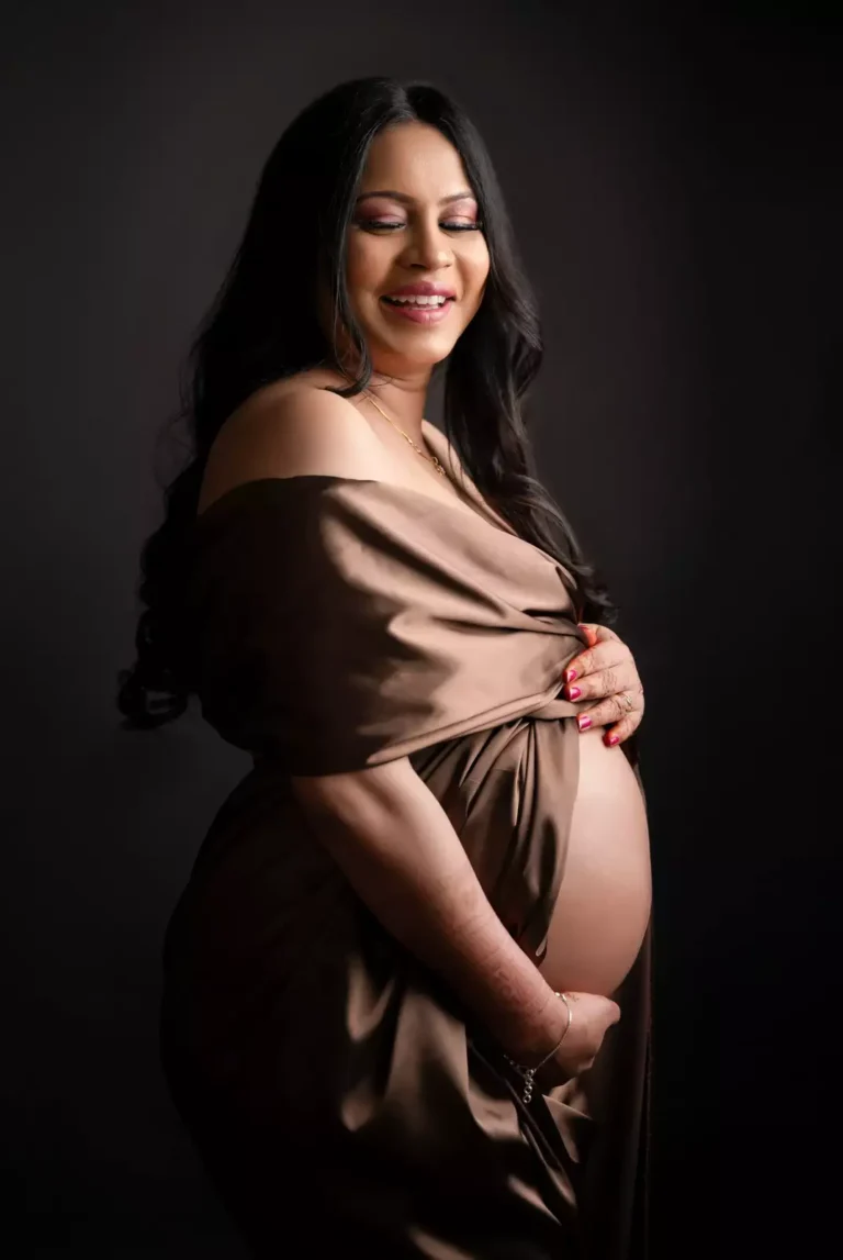 Expectant mother posing for maternity photography