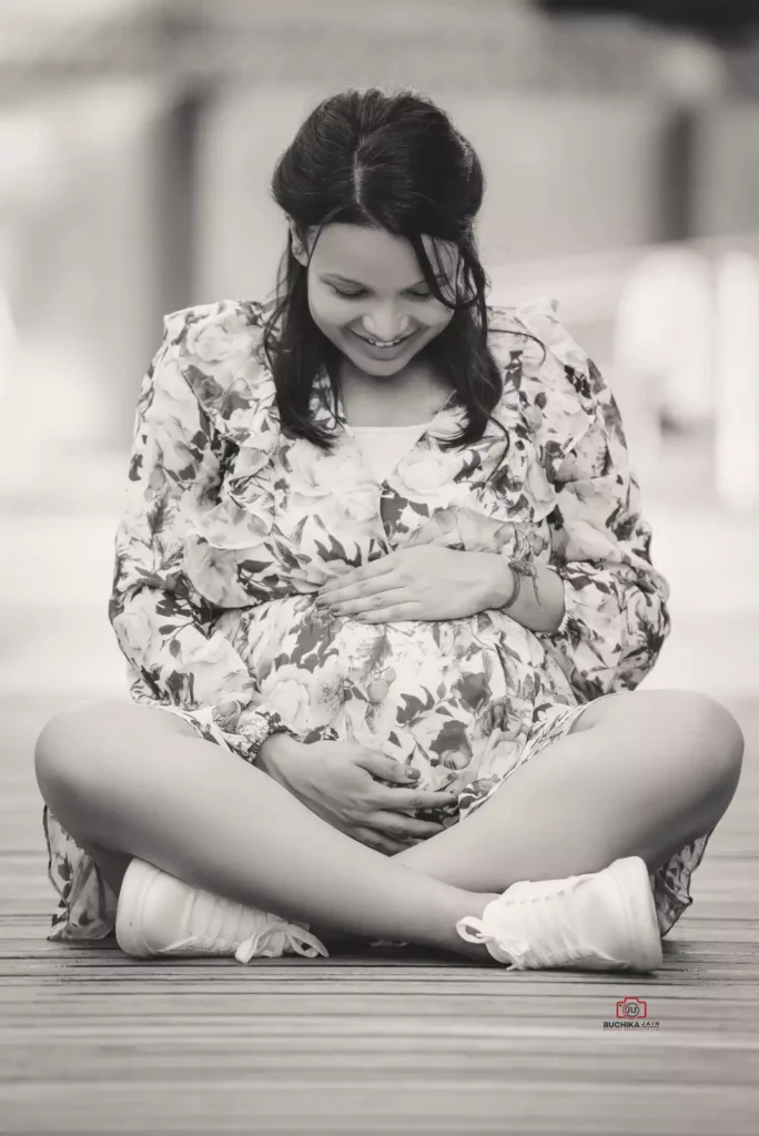 Mom-to-be radiating happiness in maternity photography session