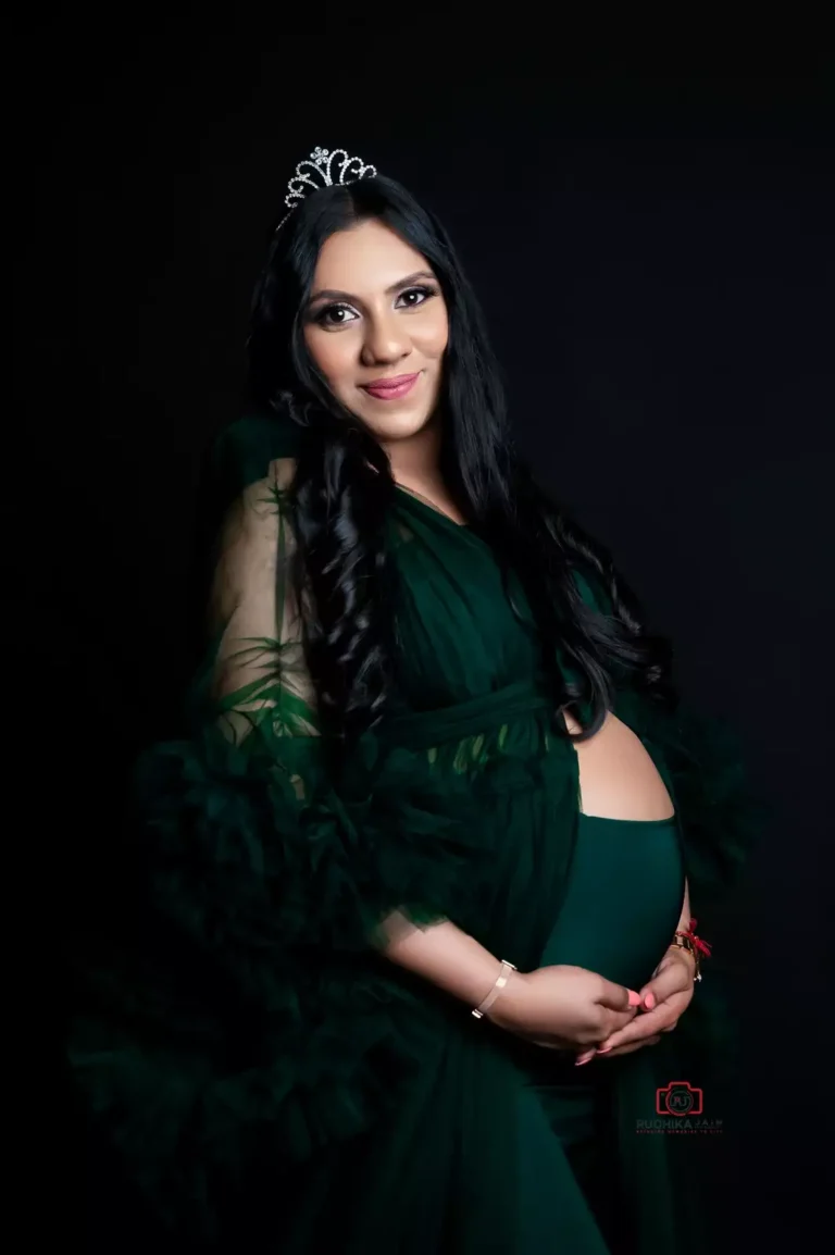 Pregnancy photoshoot featuring elegant maternity gowns