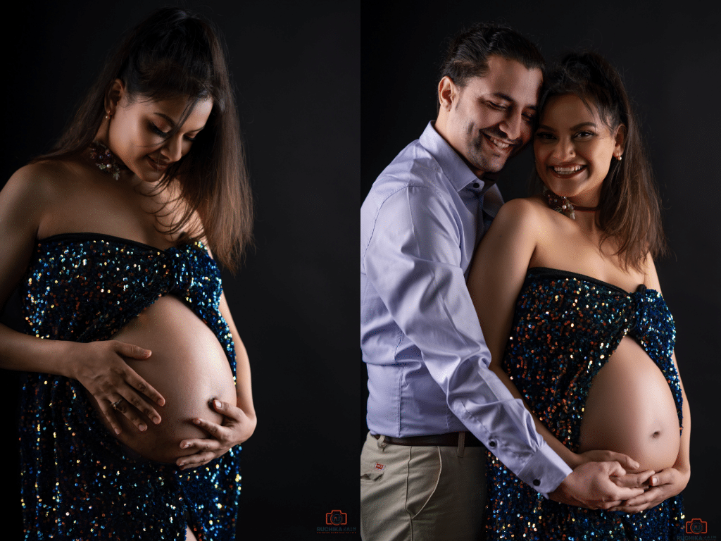 A radiant expecting mother in a sparkling gown and her partner embracing her with joy during a professional maternity photoshoot in Wellington